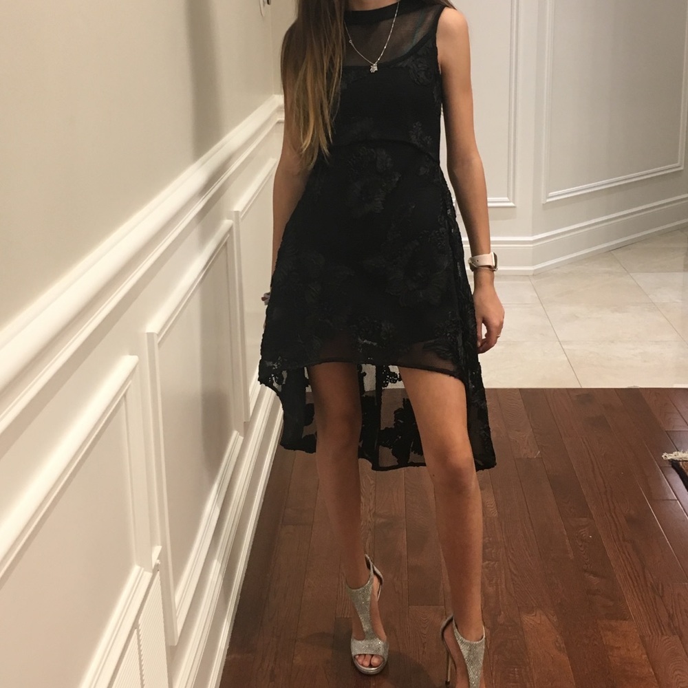 Brand new with tags. Gorgeous black Blink Blank Girls Size XS dress.
